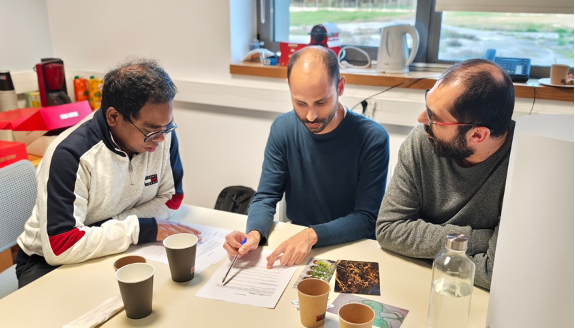 Participants exchanging ideas and perspectives during the brainstorming phase.